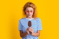 caucasian girl with icelolly ice cream on background. photo of girl with icelolly ice cream