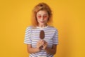 caucasian girl with icelolly ice cream on background. photo of girl with icelolly ice cream