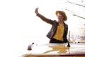 Caucasian Girl Making Selfie out of Car Sunroof Royalty Free Stock Photo