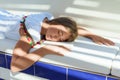 The girl fell asleep on the book. Sunny summer day. Royalty Free Stock Photo