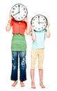 Caucasian girls holding clocks
