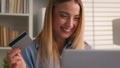 Caucasian happy smiling woman pay online shopping with laptop and bank credit card satisfied businesswoman girl buying Royalty Free Stock Photo