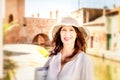 Woman in panama in medieval city Royalty Free Stock Photo