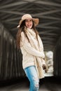 Caucasian High School Senior Candid Smiling in Knit Winter Clothes and Floppy Hat