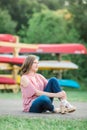 Caucasian High School Senior Girl Outside Sitting