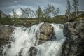 Caucasian Hiker Exploring Scenic Norwegian Waterfalls