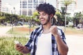 Caucasian hipster man receiving good news Royalty Free Stock Photo