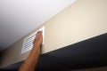 Caucasian Human Hand Placed on a Right Side of Wall Air Vent Royalty Free Stock Photo