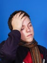 Caucasian ill boy dressed with neckscarf Royalty Free Stock Photo