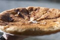 Caucasian khychin bread pie with meat close.