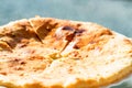 Caucasian khychin bread pie with meat close