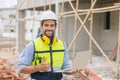 Caucasian latin worker foreman home builder hand sign thumbs up for good pass build and safety quality confirm concept