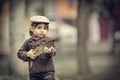 Caucasian little boy in a summer hat outdoors