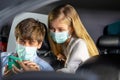 Driver in public transportation taxi wearing face protection mask to prevent disease pandemic