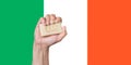 Caucasian male hand holding soap with words: Wash Your Hands against an Irish flag background Royalty Free Stock Photo