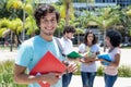 Caucasian male student with other international students Royalty Free Stock Photo