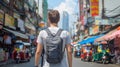 Caucasian male tourist exploring a bustling Thai street market. Young man with backpack in urban Thailand. Concept of