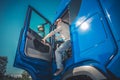 Semi Truck Driver Getting Out Of Cab Royalty Free Stock Photo