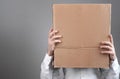 Caucasian man with a cardboard box over his head Royalty Free Stock Photo