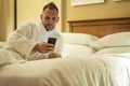 Man Checking His Social Media Profiles Before Going to Sleep Royalty Free Stock Photo