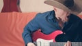 Man with beard play and sings heavy metal on electric guitar Royalty Free Stock Photo