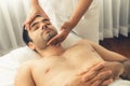 Caucasian man enjoying relaxing anti-stress head massage. Quiescent Royalty Free Stock Photo