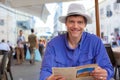 Caucasian man in fifties at outdoor restaurant in Italy Royalty Free Stock Photo