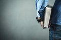 Caucasian man holding bible