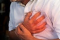 Caucasian man middle age suffering from heart attack at home Royalty Free Stock Photo