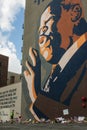 Caucasian Man Observes Makeshit Memorial At Atlanta John Lewis Mural