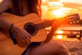 Caucasian man playing acoustic guitar on sandy beach at sunset time. Playing music concept, neural network generated Royalty Free Stock Photo