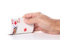 Caucasian man`s hand showing ace and king diamond poker cards isolated on white background with copy space for your text