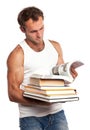 Caucasian man with a stack of books Royalty Free Stock Photo