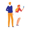 Caucasian man standing with back turned and redhead woman walking using smartphone Casual outfit, modern life and