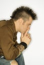Caucasian man with tattoos and mohawk. Royalty Free Stock Photo