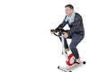 Caucasian man training with a spin bike on studio Royalty Free Stock Photo