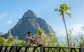 Caucasian men view at the Pitons of St Lucia Saint Lucia, Caribbean, nature trail in the jungle