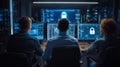 Caucasian man and woman work on cybersecurity at multiple computers and monitors Royalty Free Stock Photo