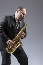 Caucasian Mature Expressive Saxophone Player