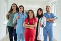 Caucasian medical students wear uniform in corridor of modern clinic Royalty Free Stock Photo