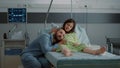 Caucasian man and woman expecting child in hospital ward Royalty Free Stock Photo