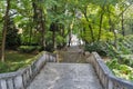 Middle aged woman walk in old park. Banska Stiavnica, Slovakia Royalty Free Stock Photo