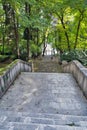 Middle aged woman walk in old park. Banska Stiavnica, Slovakia Royalty Free Stock Photo