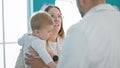 Caucasian mother with baby on a doctor appointment at clinic Royalty Free Stock Photo