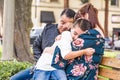 Caucasian Mother and Hispanic Father Comforting Mixed Race Son Outdoors Royalty Free Stock Photo