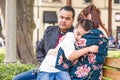 Upset Caucasian Mother and Hispanic Father Comforting Mixed Race Son Royalty Free Stock Photo