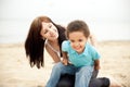 Multi-Ethnic family relaxing together outdoors Royalty Free Stock Photo