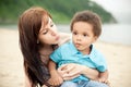 Multi-Ethnic family relaxing together outdoors Royalty Free Stock Photo