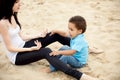 Multi-Ethnic family relaxing together outdoors Royalty Free Stock Photo