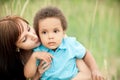 Multi-Ethnic family relaxing together outdoors Royalty Free Stock Photo